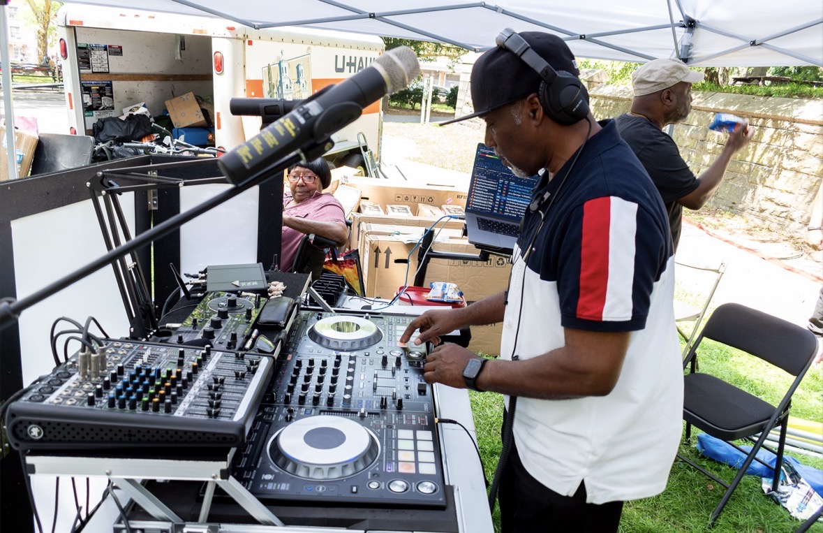 Shatiek DJing at a United Family of Stars community event