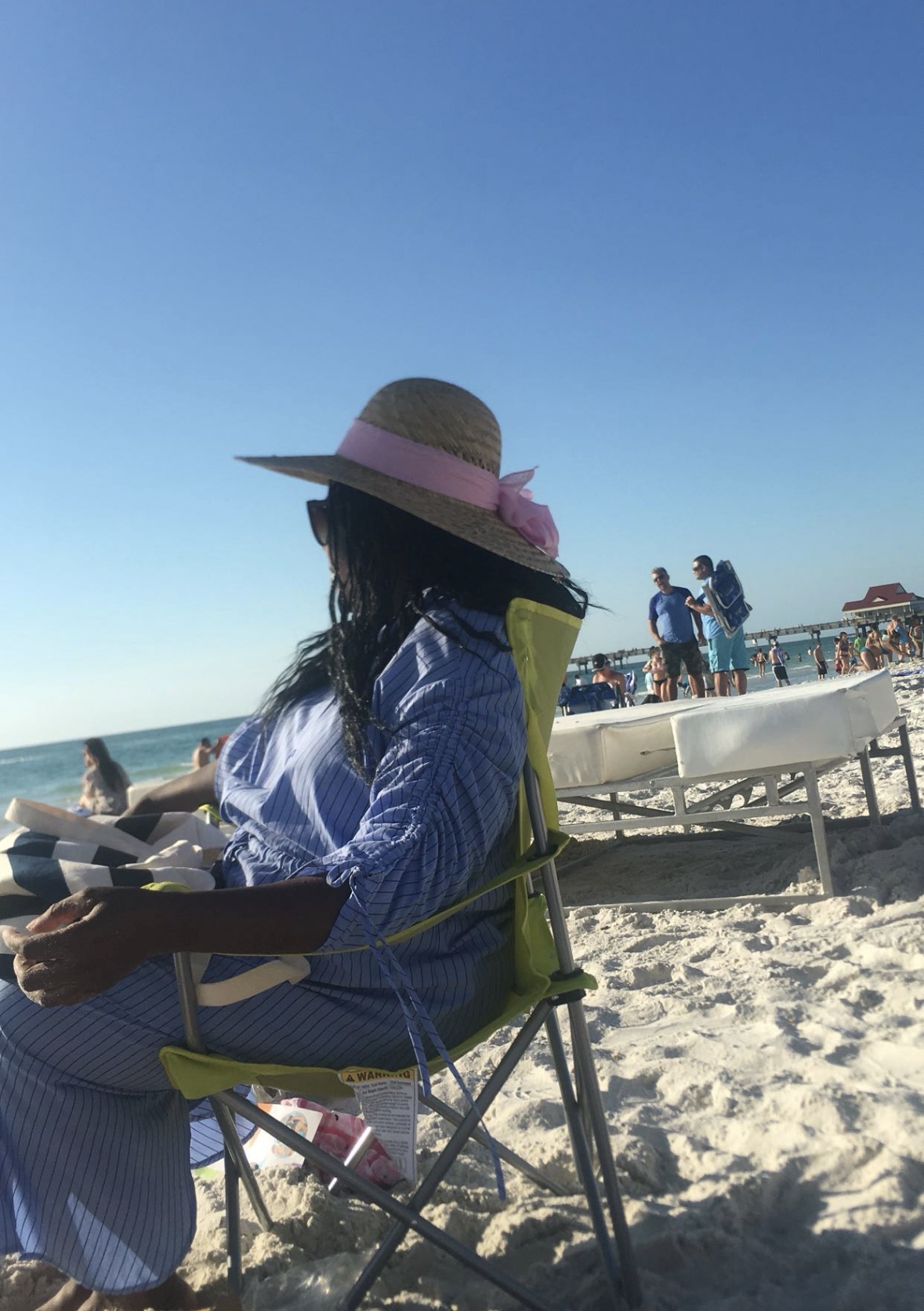 NiAsia relaxing by the beach